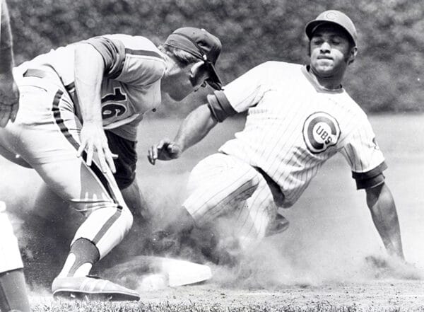 Chicago Cubs Billy Williams (26) during a game from his 1964 season. Billy  Williams played for 18 season, with 2 different teams, was a 6-time  All-Star and was inducted to the Baseball